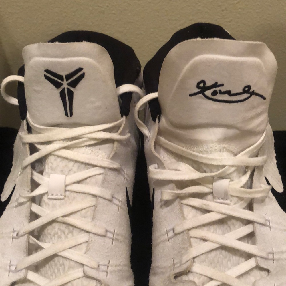 NIKE size 14; white with black swoosh.
